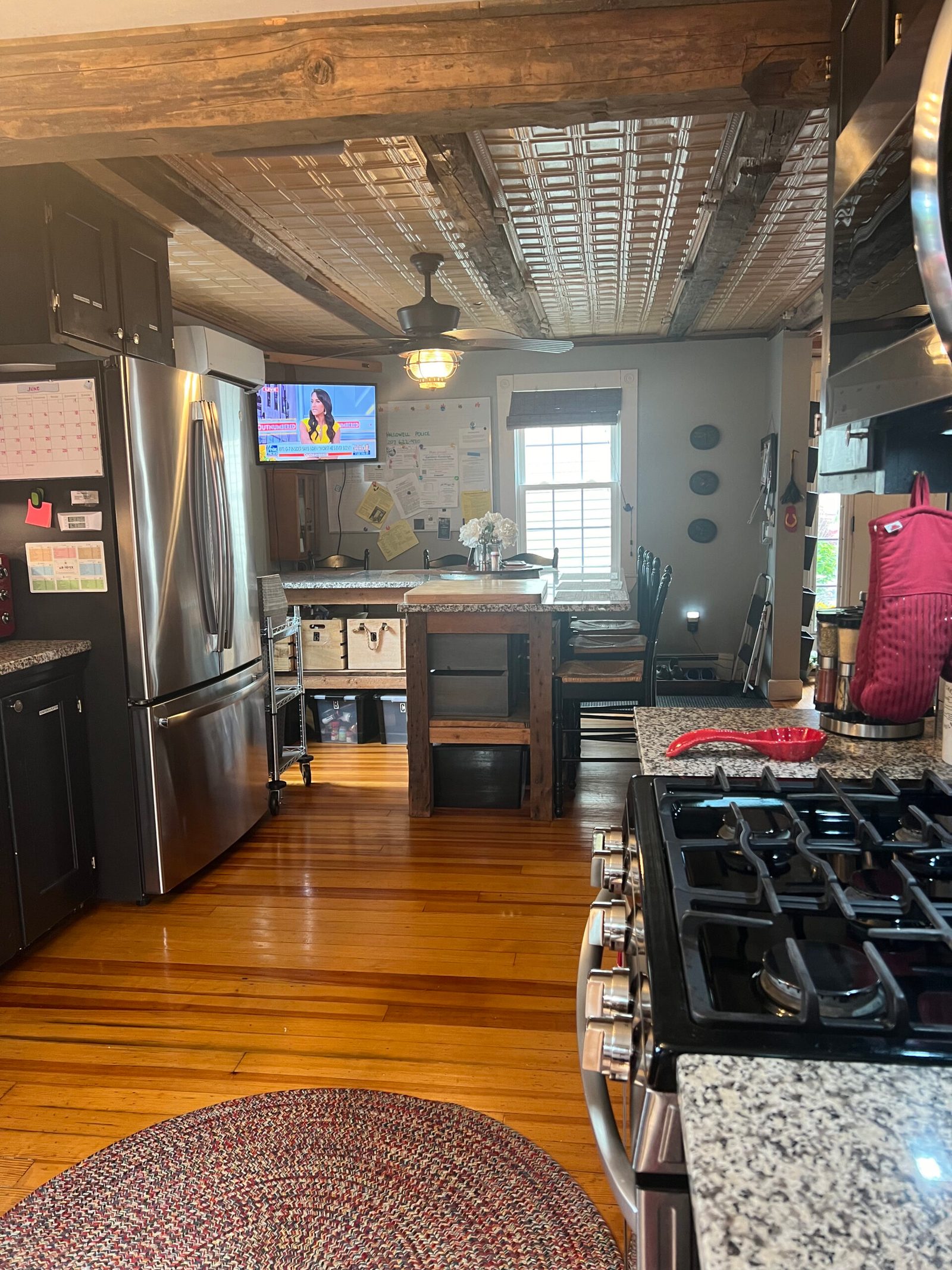 Shared kitchen with pressed-tin ceiling